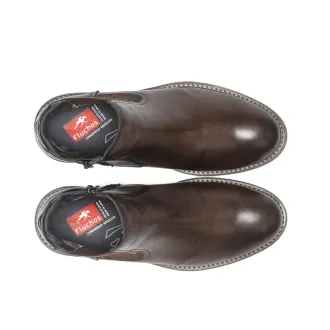 Botín FLUCHOS realizado en piel de color marrón para hombre.